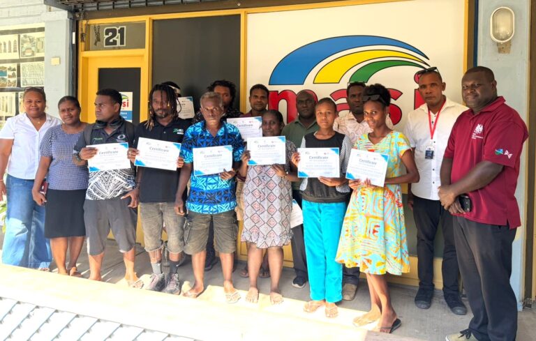 Participants of the workshop pose with their certificates
