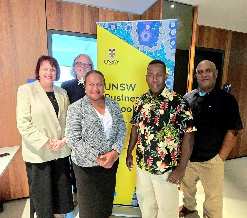 Australian Graduate School of Management staff Ms Adele Seale and Mr Matthew Byrne with Ms Elizabeth Osifelo, Mr Ofani Eremae, and Mr Benjamin Afuga. Photo credit @ AHC